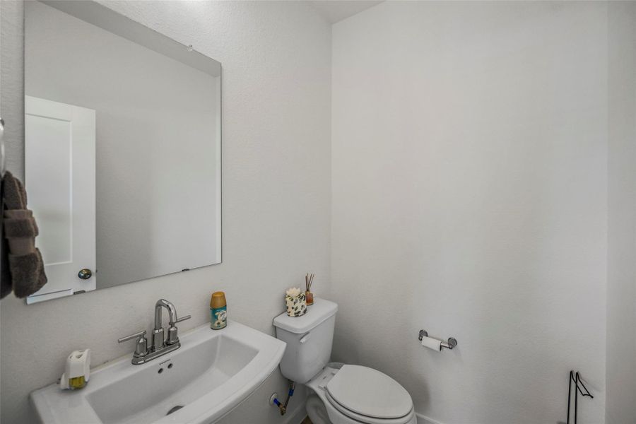 Furnished interior view inside a new home in Sorella, Tomball (Image 7).