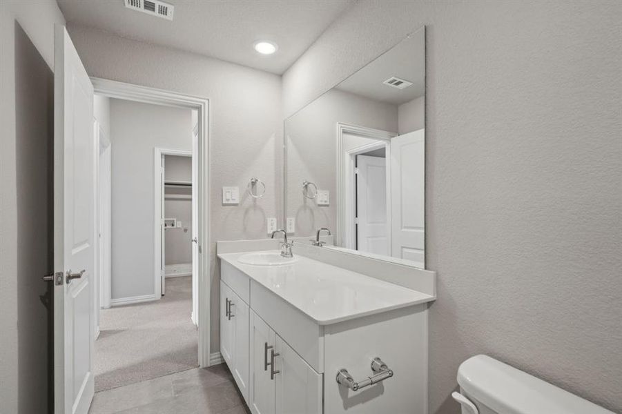 Photo is not of the actual home, but is an inspirational photo of builder’s model home and may depict options, furnishings, and/or decorator features that are not included.