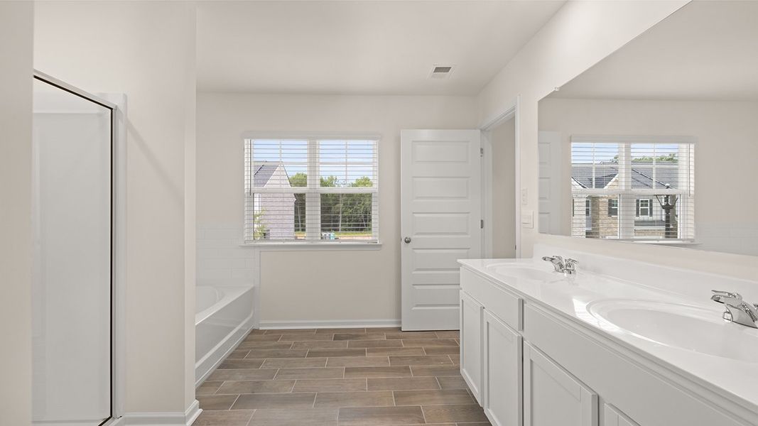 Furnished interior view inside a new home in Independence Villas and Townhomes, Loganville (Image 9).