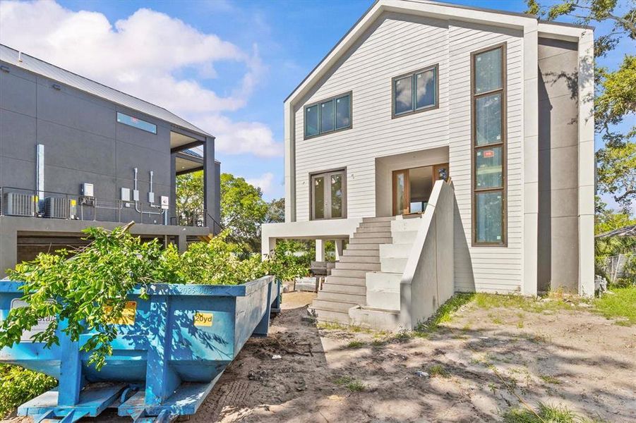Front exterior of a new home in , Clearwater, FL, highlighting curb appeal (Image 22).