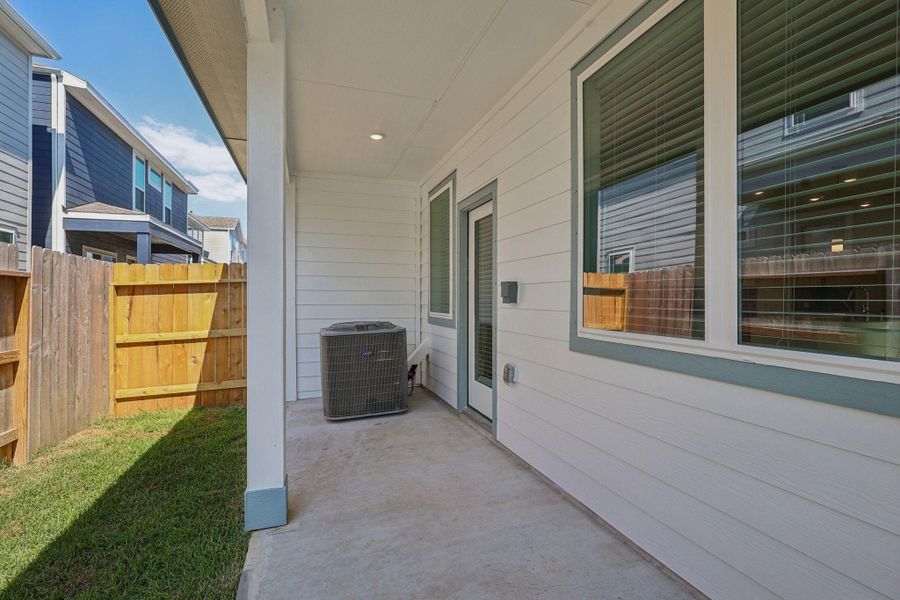 Exterior details and patio area of a home in Kemah Crossing - City Series, Kemah (Image 3). Exterior details and patio area of a home in Kemah Crossing - City Series, Kemah (Image 3).