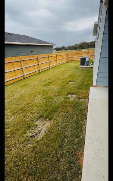 Exterior details and patio area of a home in Valverde, Bastrop (Image 2).