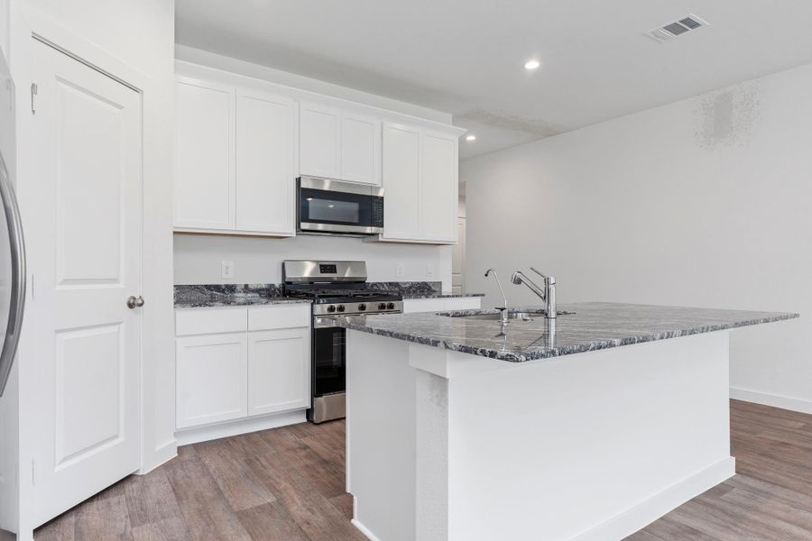 Furnished interior view inside a new home in Blue Heron Estates, Beasley (Image 16).