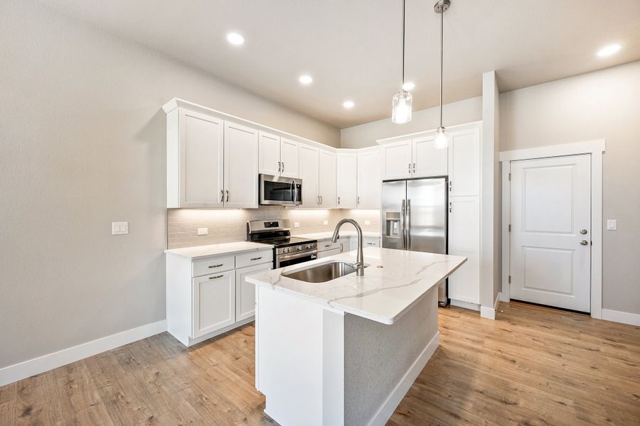 Furnished interior view inside a new home in The Lakes at Centerra, Loveland (Image 4).
