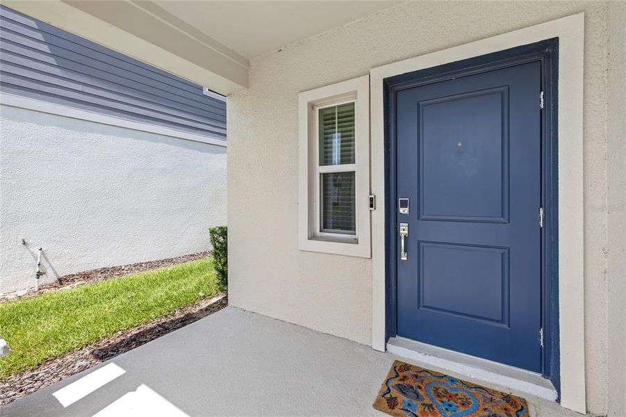 Exterior details and patio area of a home in Wellness Ridge, Clermont (Image 3).
