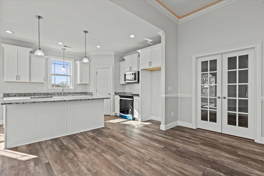 Representative furnished interior of a home built from the Roosevelt by Enchanted Homes in Messer Farms, Inman (Image 7). Representative furnished interior of a home built from the Roosevelt by Enchanted Homes in Messer Farms, Inman (Image 7).