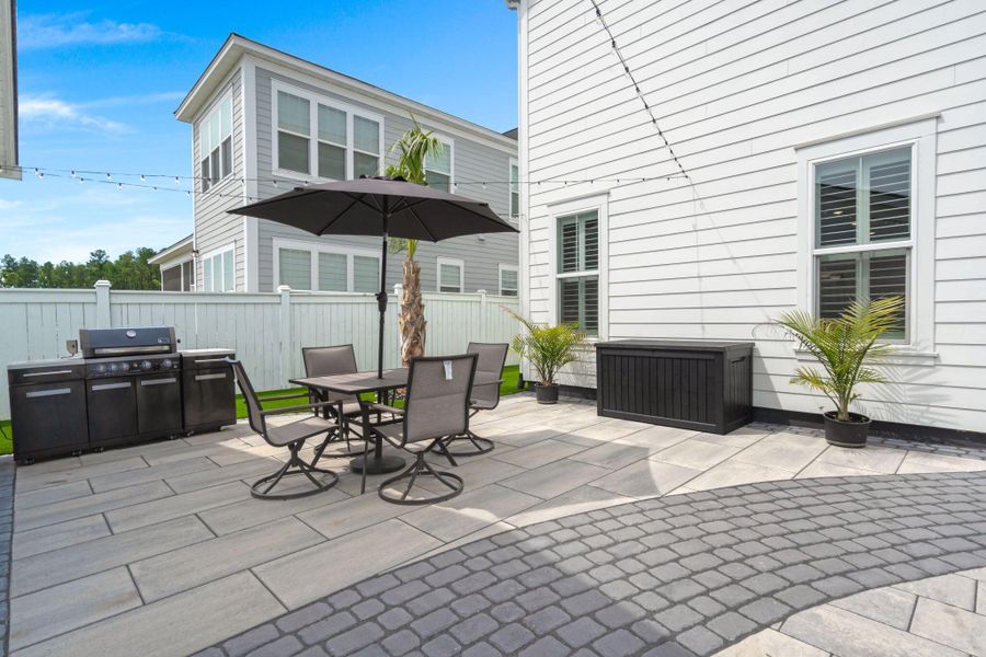 Front exterior of a new home in Nexton, Summerville, SC, highlighting curb appeal (Image 18). Front exterior of a new home in Nexton, Summerville, SC, highlighting curb appeal (Image 18).