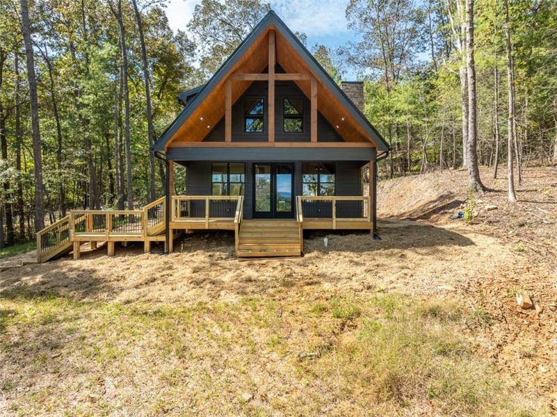 Exterior details and patio area of a home in , Ellijay (Image 35).