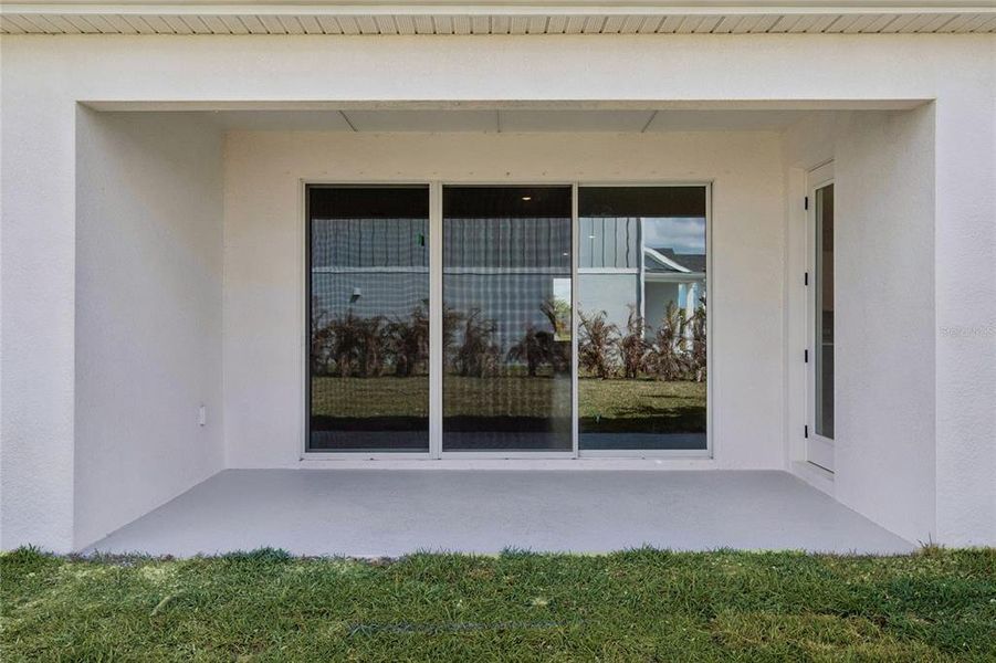 Exterior details and patio area of a home in Coasterra, Palmetto (Image 20).