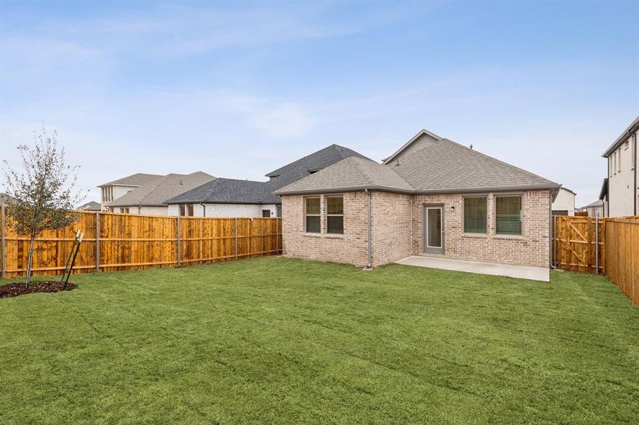 Backyard in the Elm home plan by Trophy Signature Homes – REPRESENTATIVE PHOTO Backyard in the Elm home plan by Trophy Signature Homes – REPRESENTATIVE PHOTO