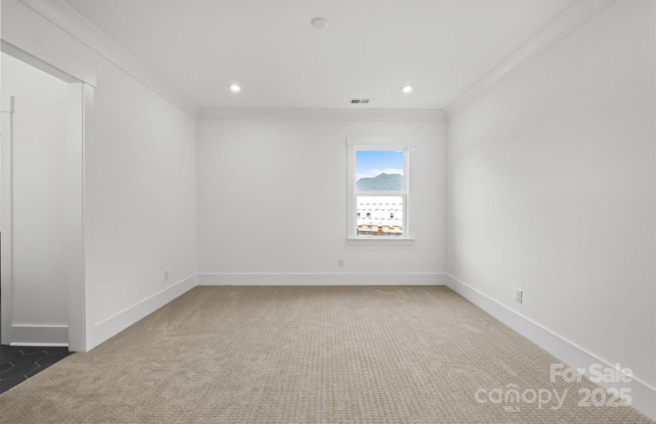 Bedroom 2.  Representative photo