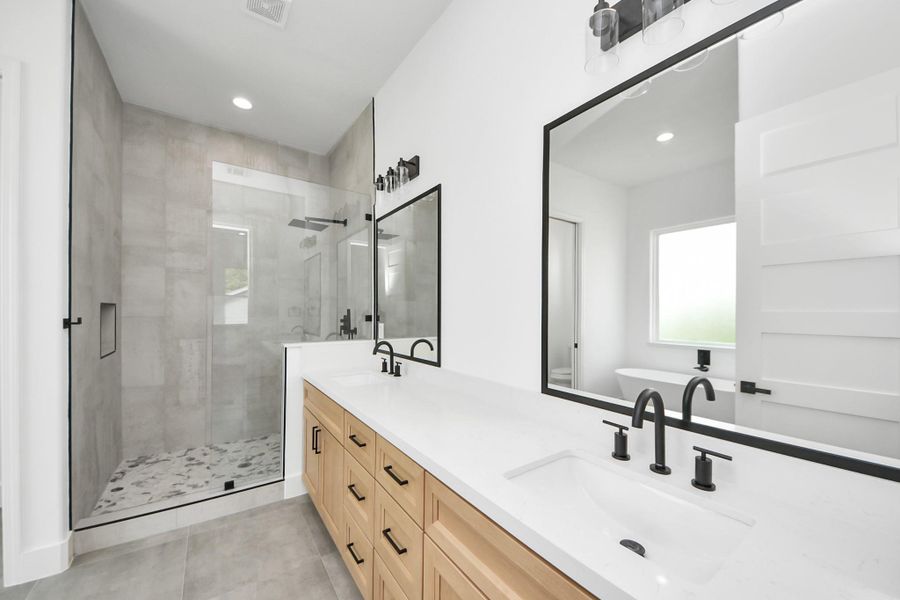 Primary bathroom w/ large shower & dual vanites, natural light. Primary bathroom w/ large shower & dual vanites, natural light.