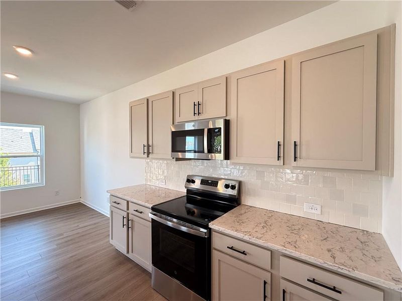 Furnished interior view inside a new home in Leydenview, Mableton (Image 26).