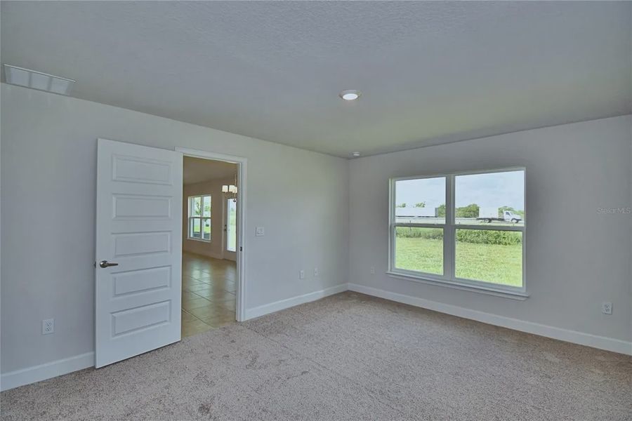 Spacious, unfurnished interior of a new home in Cadence Crossing, Auburndale (Image 32).