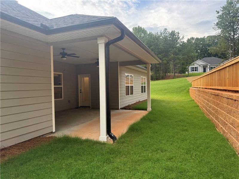 Exterior details and patio area of a home in The Fields of Walnut Creek, Pendergrass (Image 17). Exterior details and patio area of a home in The Fields of Walnut Creek, Pendergrass (Image 17).