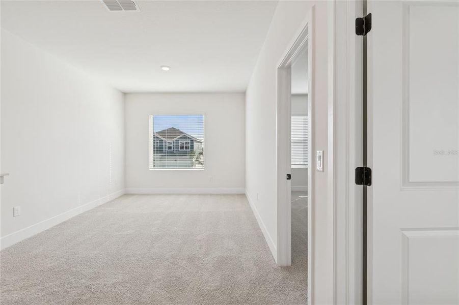 Spacious, unfurnished interior of a new home in North River Ranch – Townhomes, Parrish (Image 23).