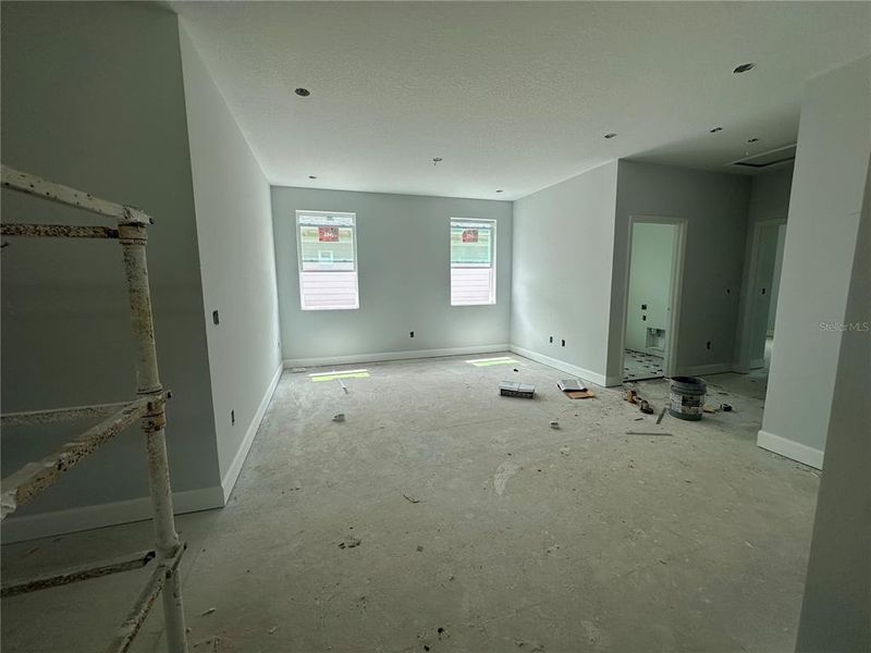 Spacious, unfurnished interior of a new home in Lake Star at Ovation, Winter Garden (Image 38).