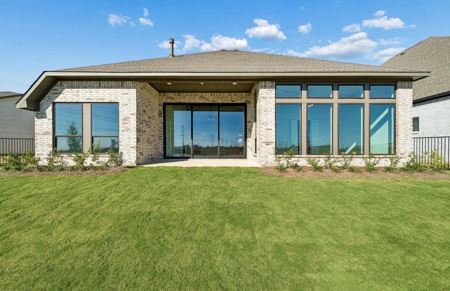 Exterior details and patio area of a home in Bridgeland 60′, Cypress (Image 3).