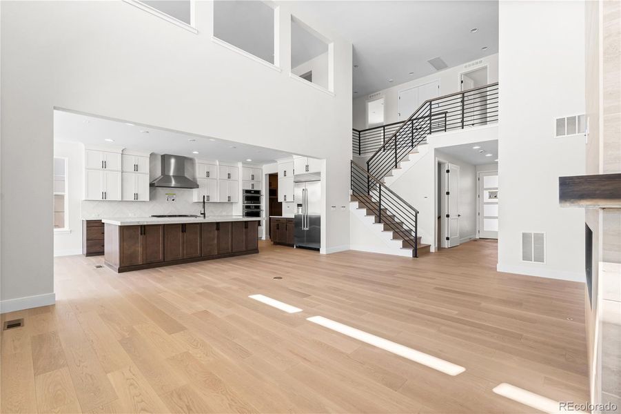 Spacious, unfurnished interior of a new home in Luxe at The Canyons, Castle Pines (Image 40).