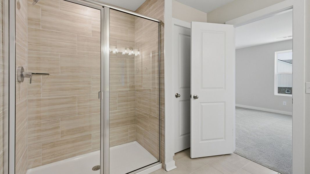 Shower in primary bedroom