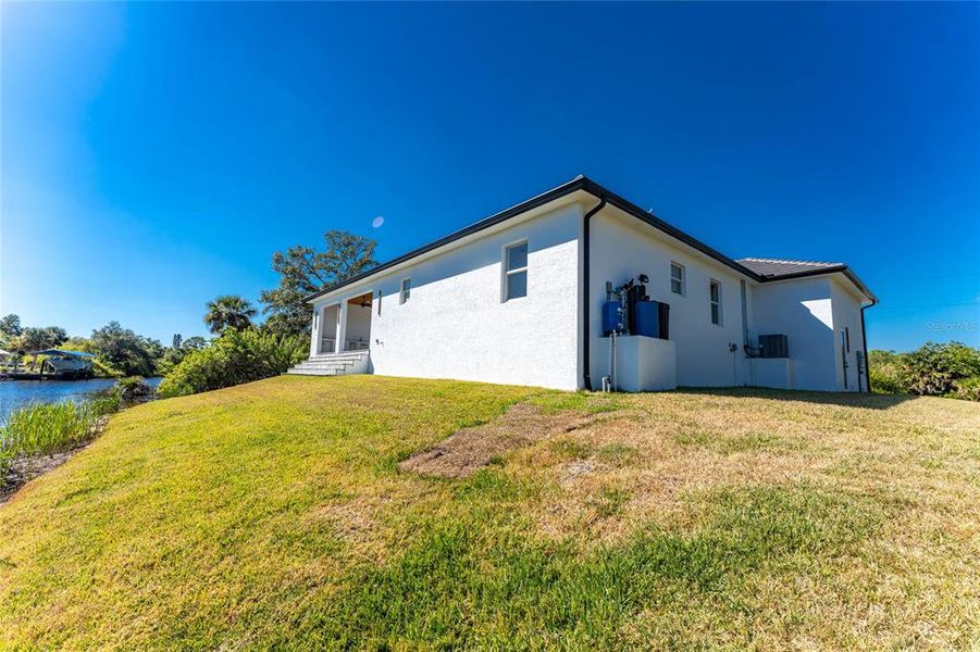 Exterior details and patio area of a home in , Port Charlotte (Image 41). Exterior details and patio area of a home in , Port Charlotte (Image 41).