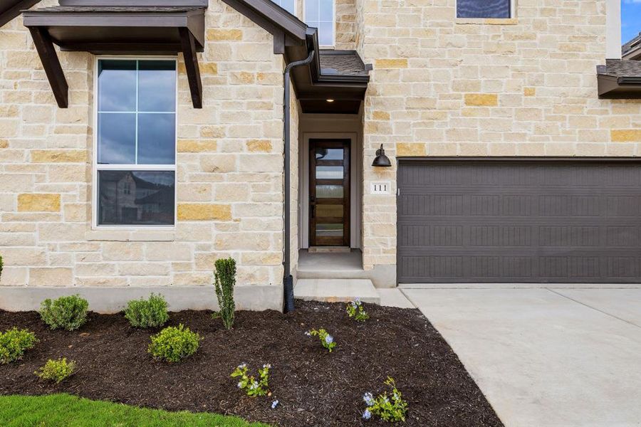 Exterior details and patio area of a home in Heritage, Dripping Springs (Image 3).