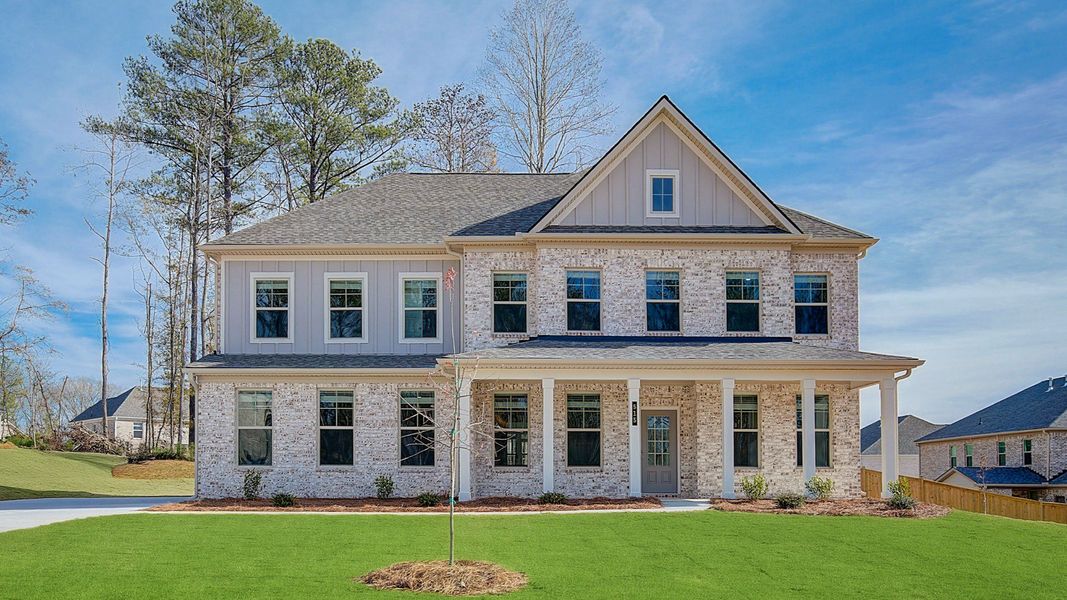 Representative exterior photo of a completed home built from the Stonefield by DRB Homes in Trinity Park, McDonough, GA (Image 18).