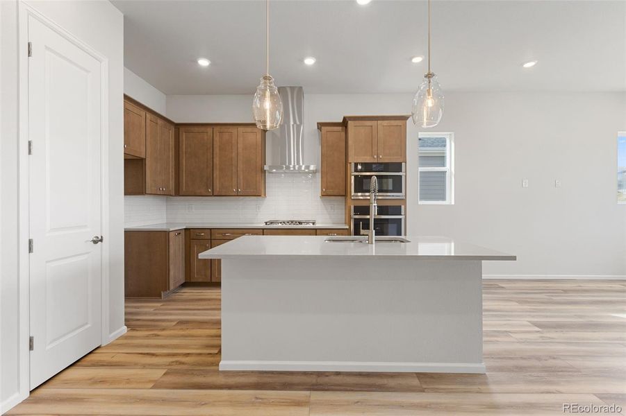 Furnished interior view inside a new home in The Manors Collection at Golden Overlook, Lakewood (Image 8).