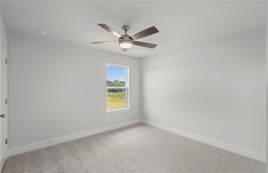 Spacious, unfurnished interior of a new home in Creekside at Skelton, Jefferson (Image 16).
