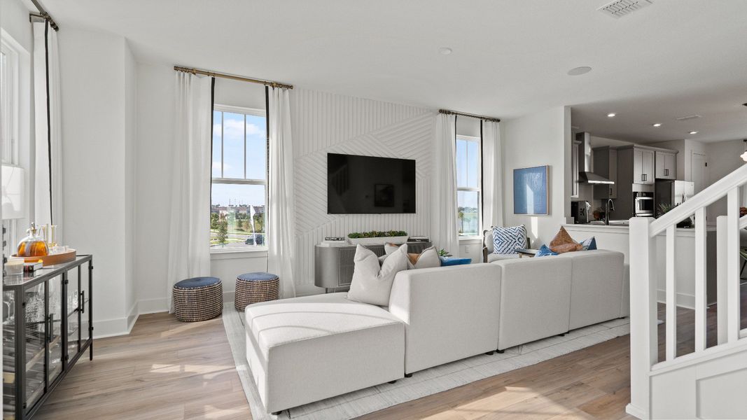 Furnished interior view inside a new home in Parkview at Hamlin, Winter Garden (Image 13).