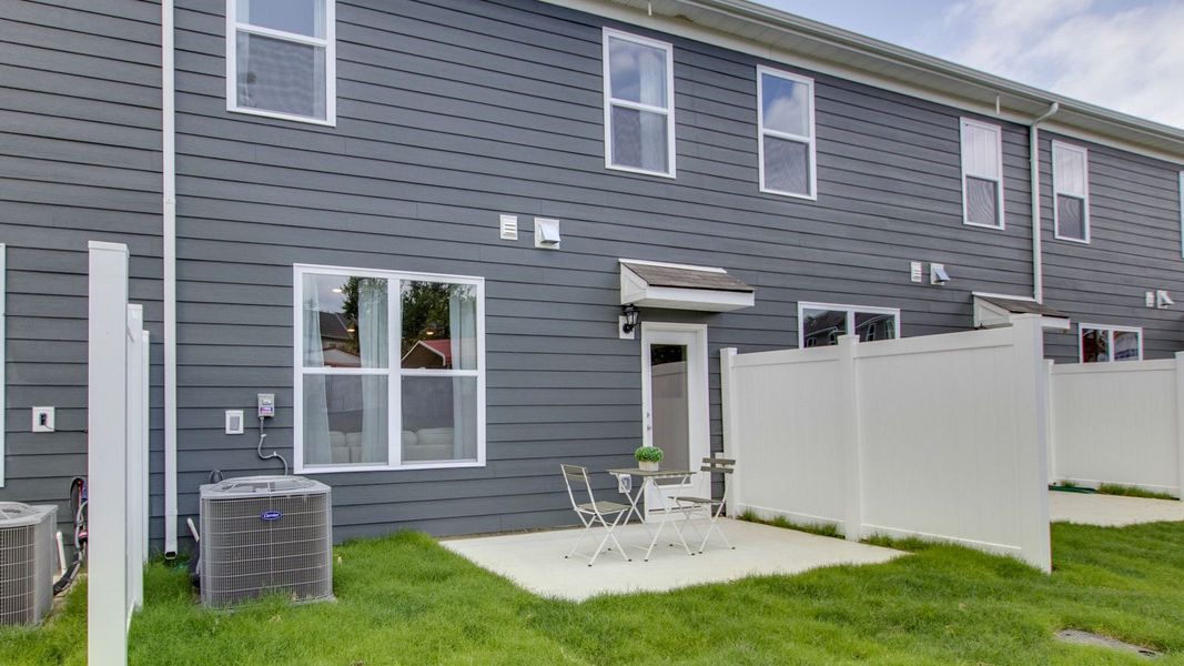 Exterior details and patio area of a home in River Landing Townhomes, Murfreesboro (Image 3). Exterior details and patio area of a home in River Landing Townhomes, Murfreesboro (Image 3).