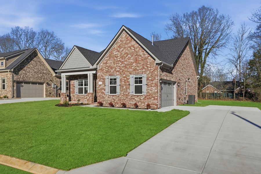Front exterior of a new home in Sagewood, Tullahoma, TN, highlighting curb appeal (Image 20).