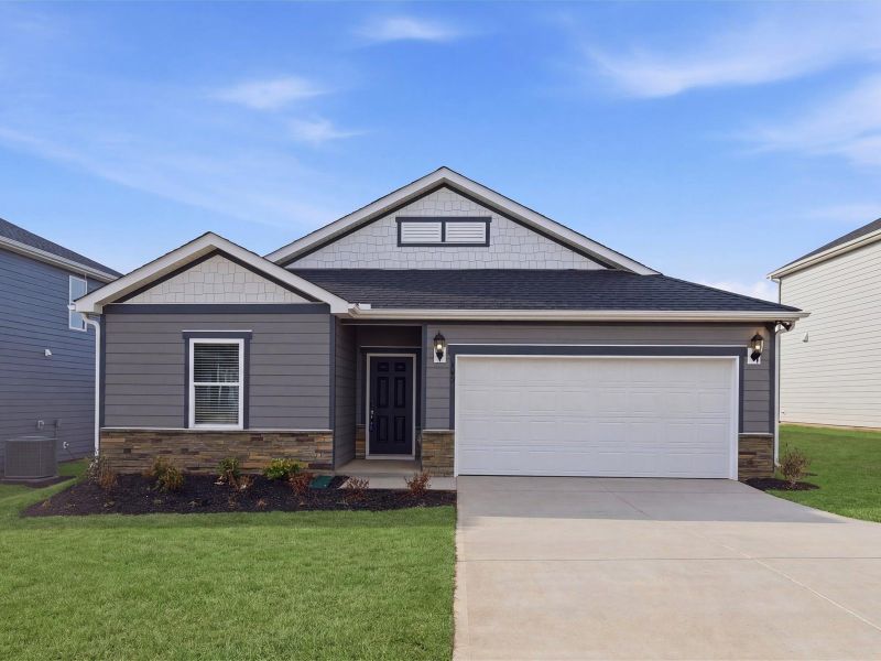Front exterior of a new home in Wexford Park, Fountain Inn, SC, highlighting curb appeal (Image 1). Front exterior of a new home in Wexford Park, Fountain Inn, SC, highlighting curb appeal (Image 1).