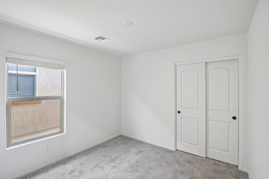 Spacious, unfurnished interior of a new home in The Landings at Rancho Del Lago, Vail (Image 14).