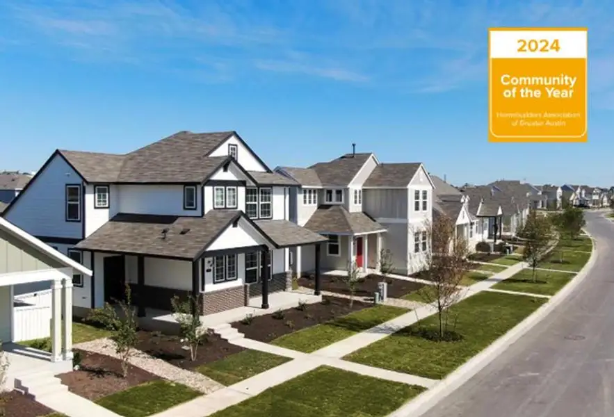 Front exterior of a new home in Casetta Ranch, Kyle, TX, highlighting curb appeal (Image 2). Front exterior of a new home in Casetta Ranch, Kyle, TX, highlighting curb appeal (Image 2).