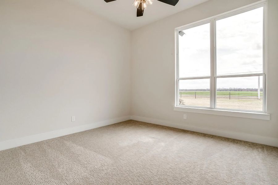 Representative unfurnished interior of a home built from the The Carley by Elmwood Custom Homes in Matthews Farm, Venus (Image 51).