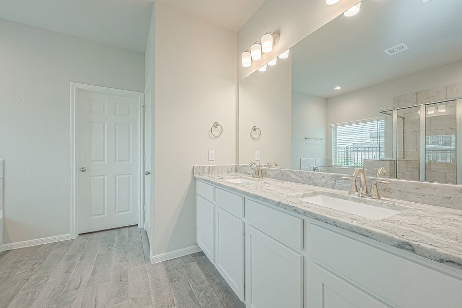 Representative furnished interior of a home built from the Floor Plan 2050 by Colina Homes in Grand Magnolia, Magnolia (Image 7).