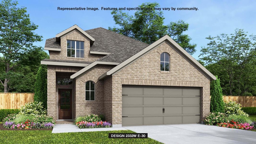 View of front facade featuring a garage