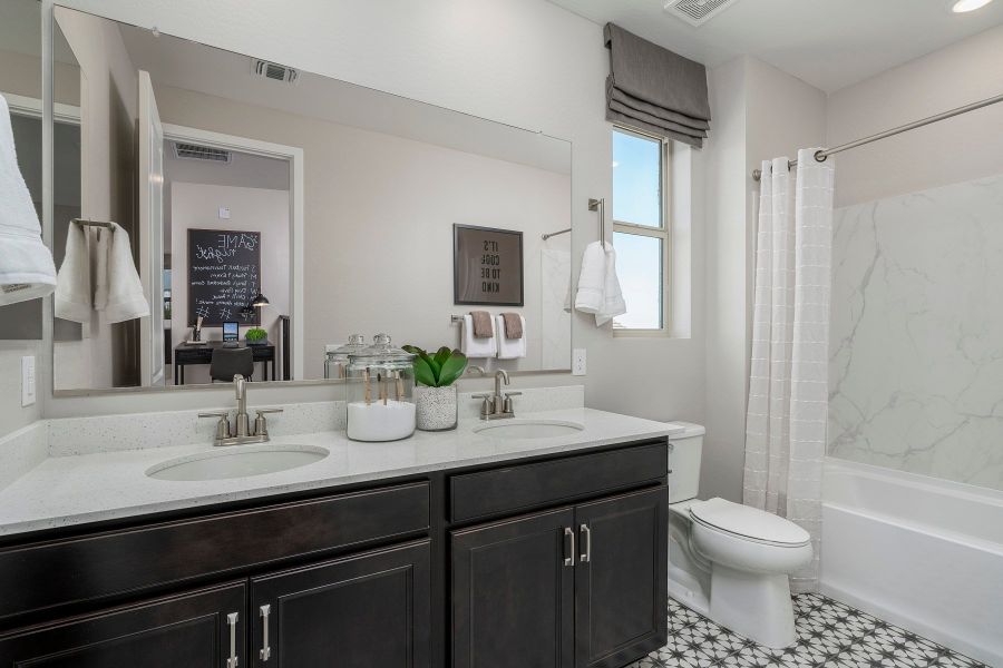Representative furnished interior of a home built from the Grand 5G by Risewell Homes in Wildera, San Tan Valley (Image 13).
