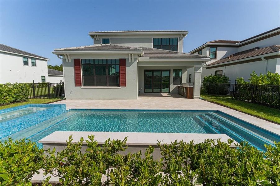 Exterior details and patio area of a home in Tesoro Club, Port St. Lucie (Image 2).
