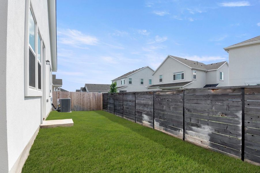 Exterior details and patio area of a home in The Enclave at Hidden Oaks, Georgetown (Image 4). Exterior details and patio area of a home in The Enclave at Hidden Oaks, Georgetown (Image 4).