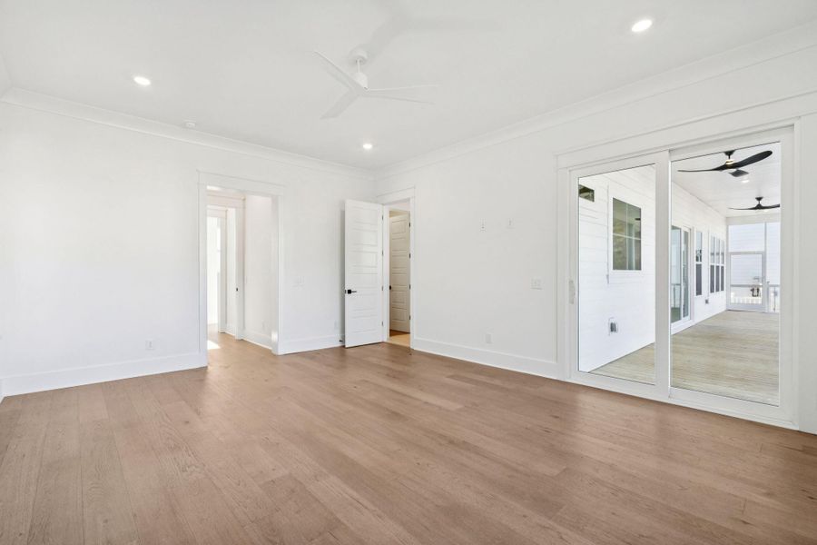 Spacious, unfurnished interior of a new home in Overlook at Copahee Sound, Awendaw (Image 60).