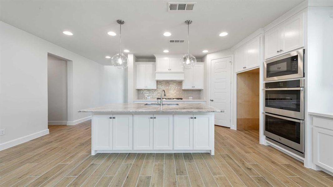 Furnished interior view inside a new home in The Heights At Uptown Celina 50', Celina (Image 6). Furnished interior view inside a new home in The Heights At Uptown Celina 50', Celina (Image 6).