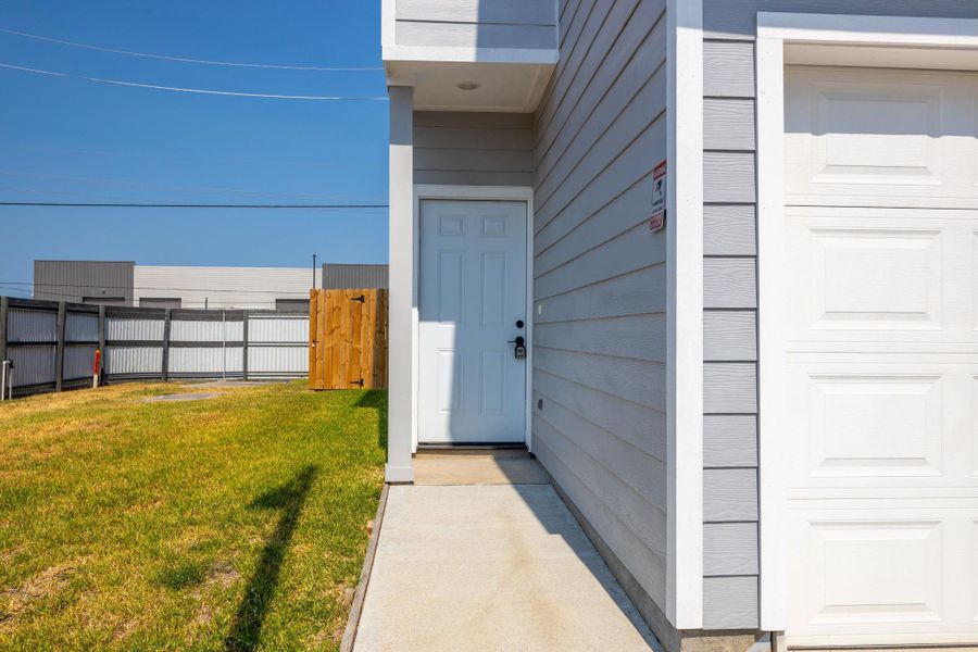 Exterior details and patio area of a home in , Spring (Image 3).