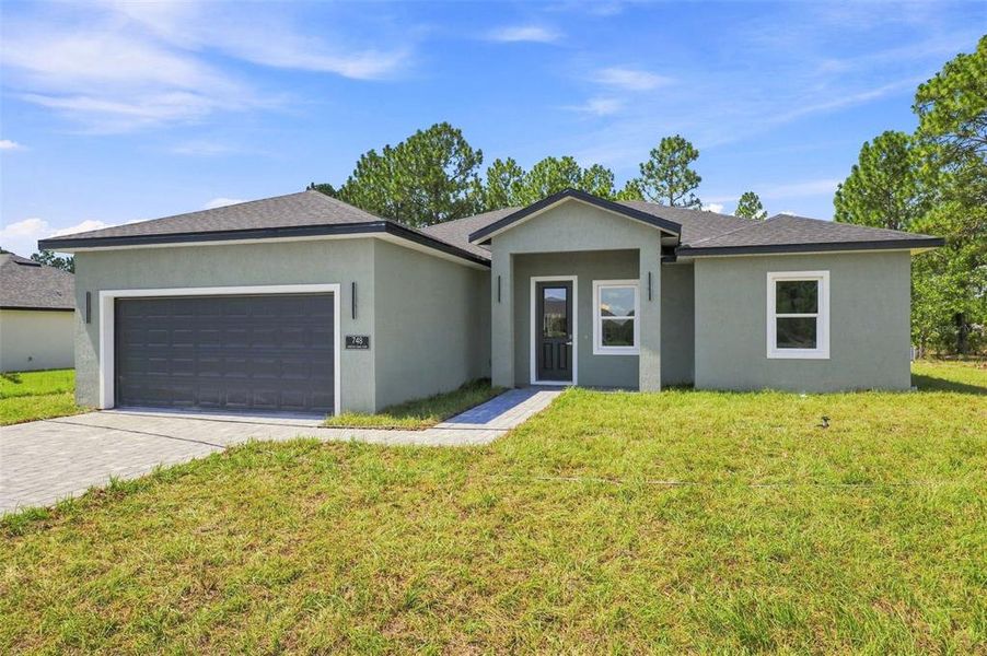 Front exterior of a new home in , Ocala, FL, highlighting curb appeal (Image 20). Front exterior of a new home in , Ocala, FL, highlighting curb appeal (Image 20).