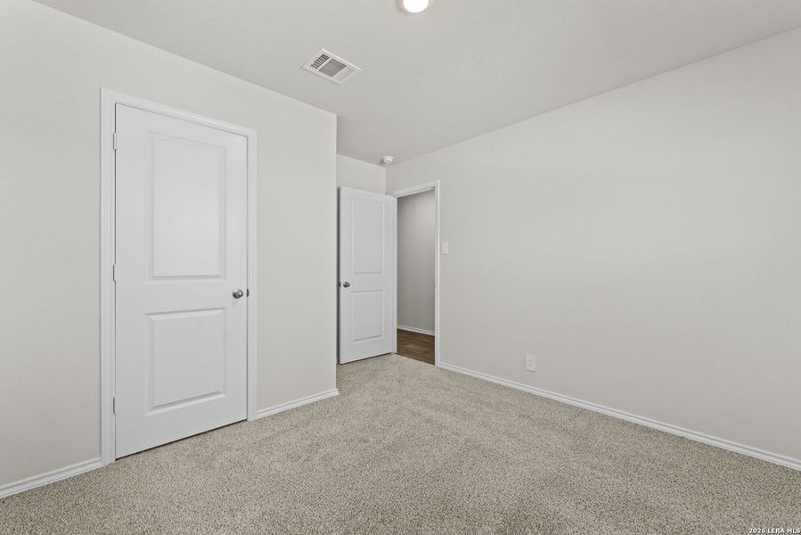 Spacious, unfurnished interior of a new home in Redbird Ranch, San Antonio (Image 13).