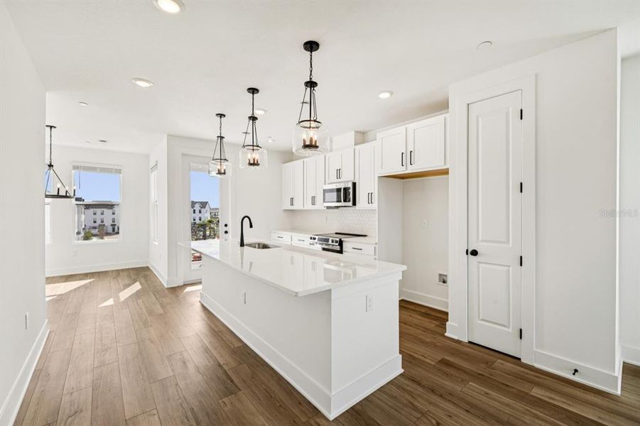 Furnished interior view inside a new home in Parkview at Hamlin, Winter Garden (Image 9).