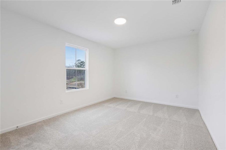 Spacious, unfurnished interior of a new home in The Pointe at Heron Bay, Locust Grove (Image 31).