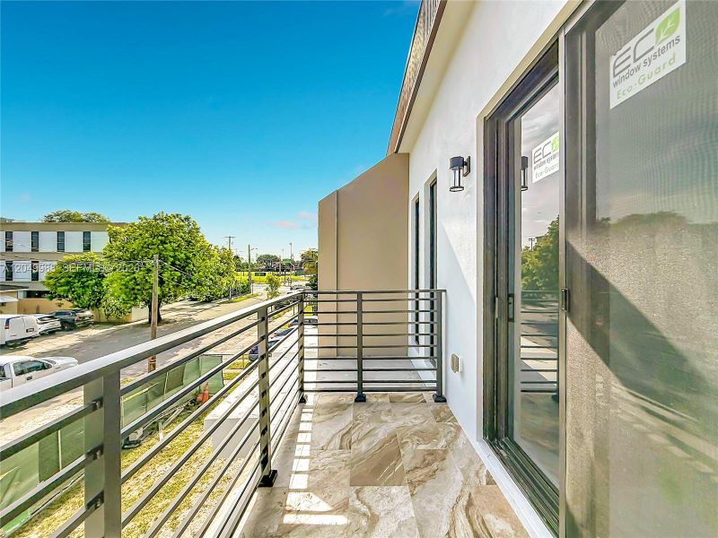 Exterior details and patio area of a home in , Miami (Image 18).