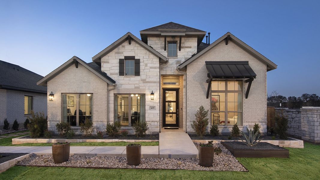 Front exterior of a new home in 6 Creeks 50', Kyle, TX, highlighting curb appeal (Image 1). Front exterior of a new home in 6 Creeks 50', Kyle, TX, highlighting curb appeal (Image 1).
